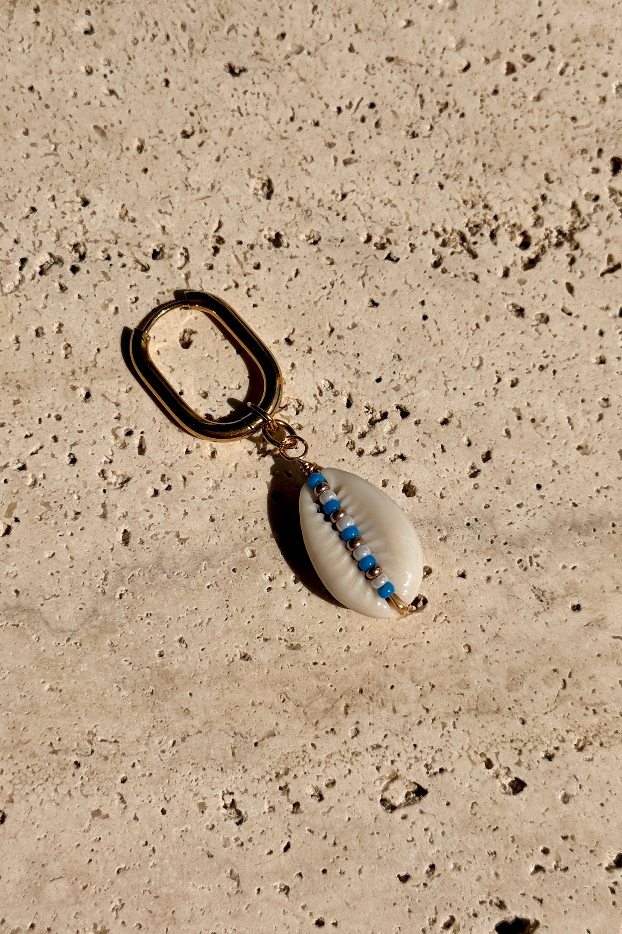 Boucle d'oreille Cauri