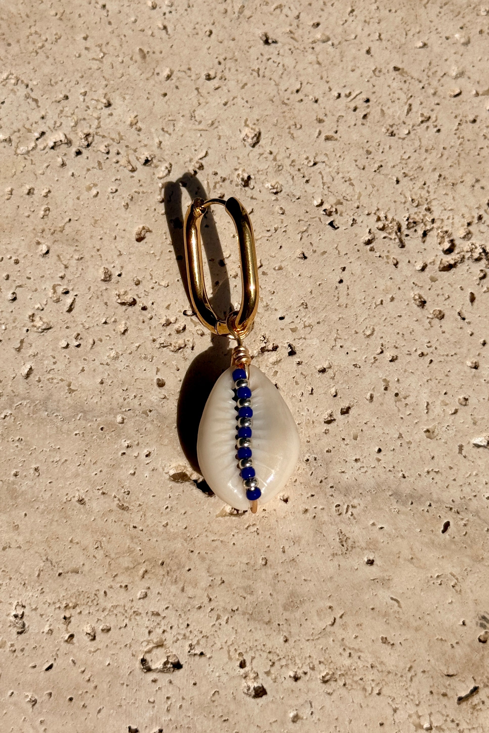 Boucle d'oreille Cauri