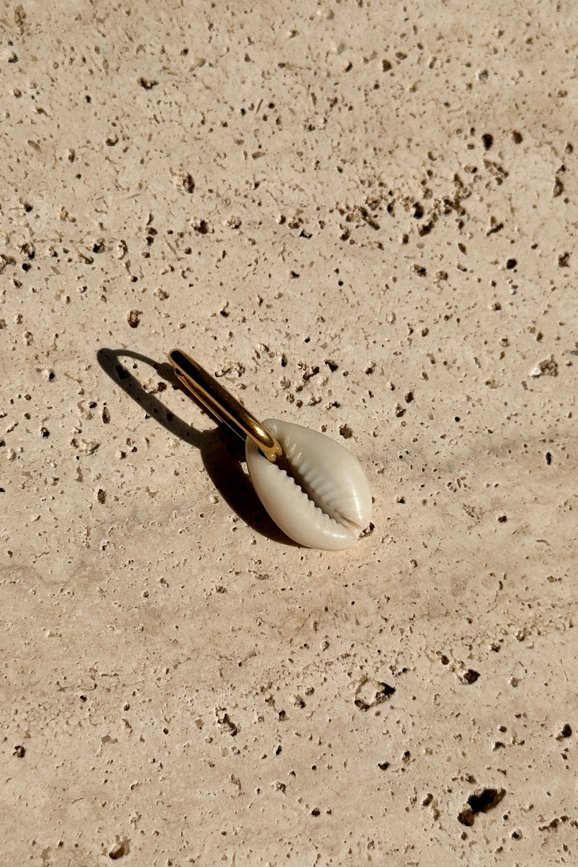 Boucle d'oreille Cauri