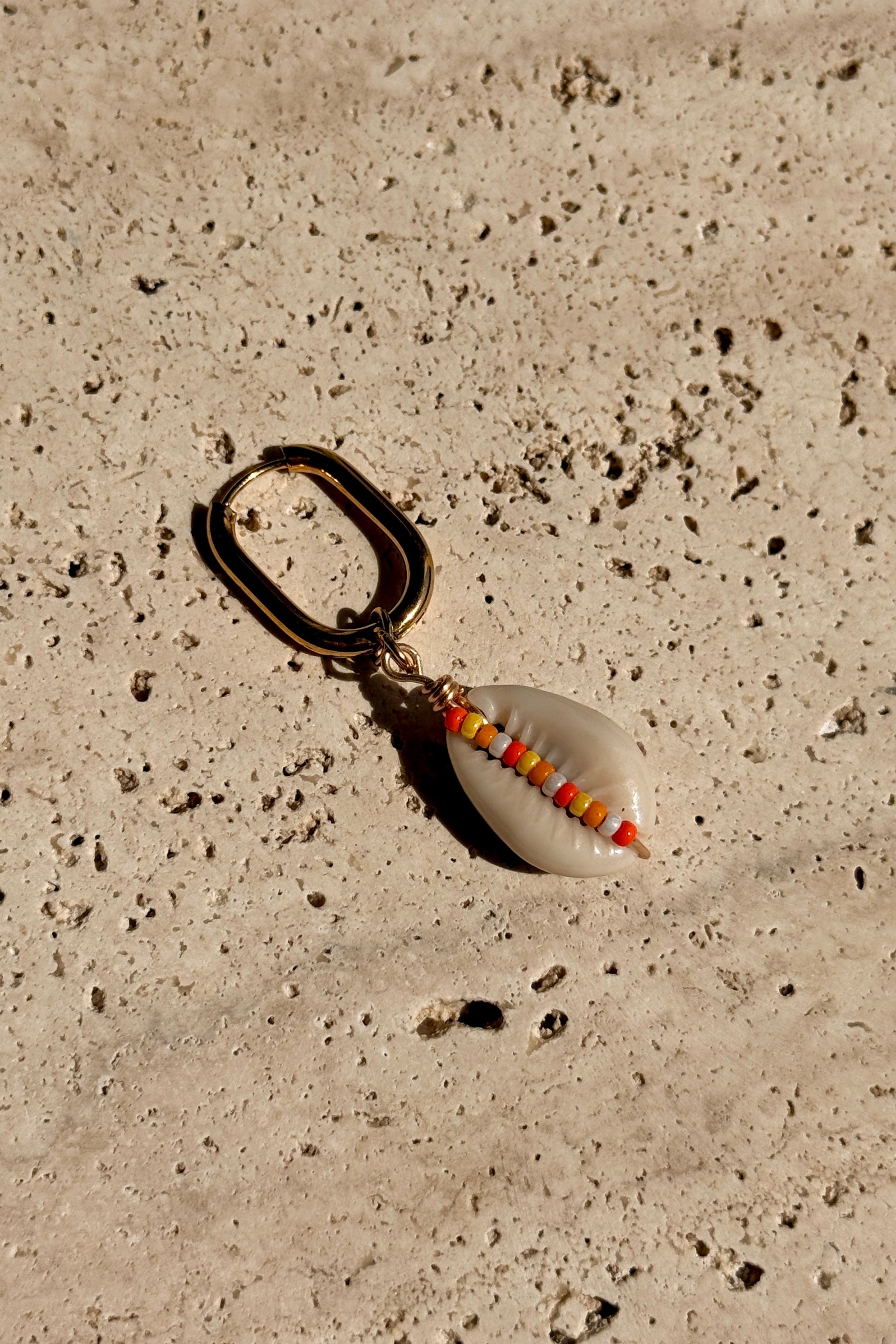 Boucle d'oreille Cauri