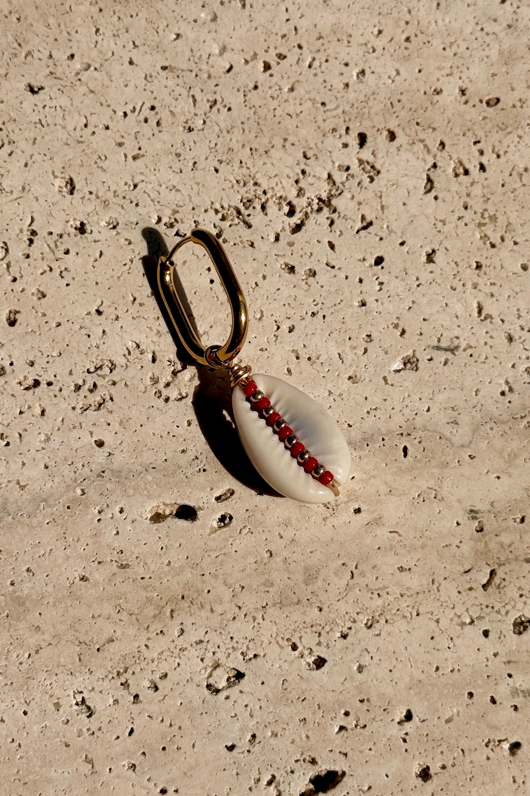 Boucle d'oreille Cauri