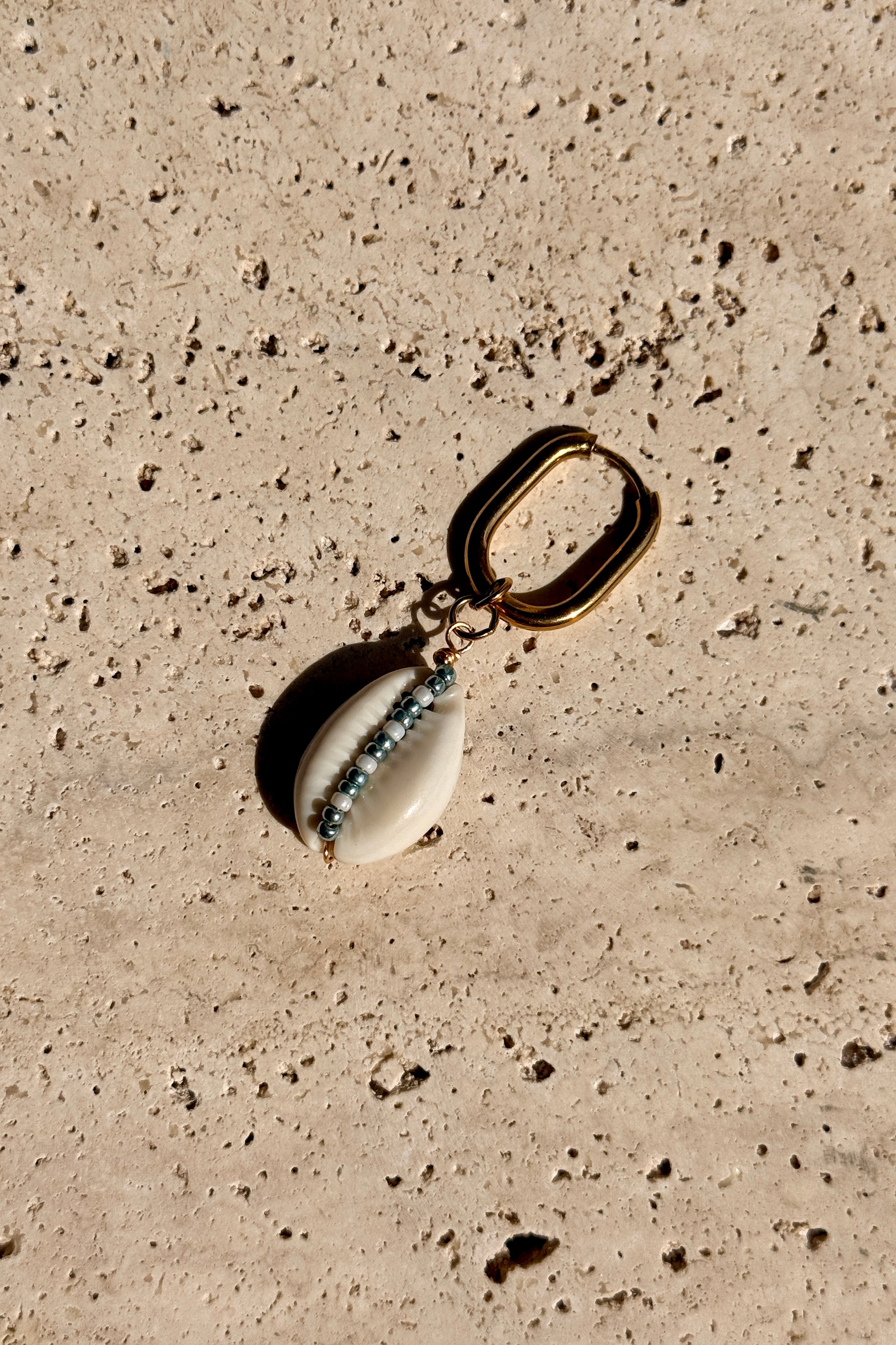 Boucle d'oreille Cauri