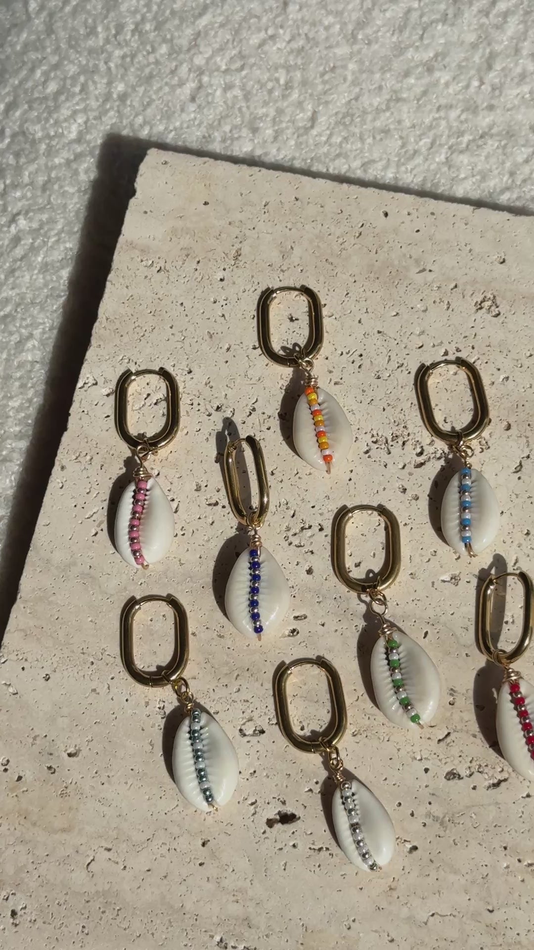 Boucle d'oreille Cauri